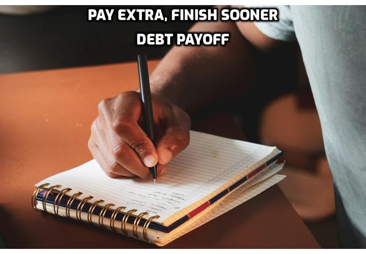 A real photograph of a person crossing off a debt payment on a paper planner at a tidy desk, with the headline Pay Extra, Finish Sooner.